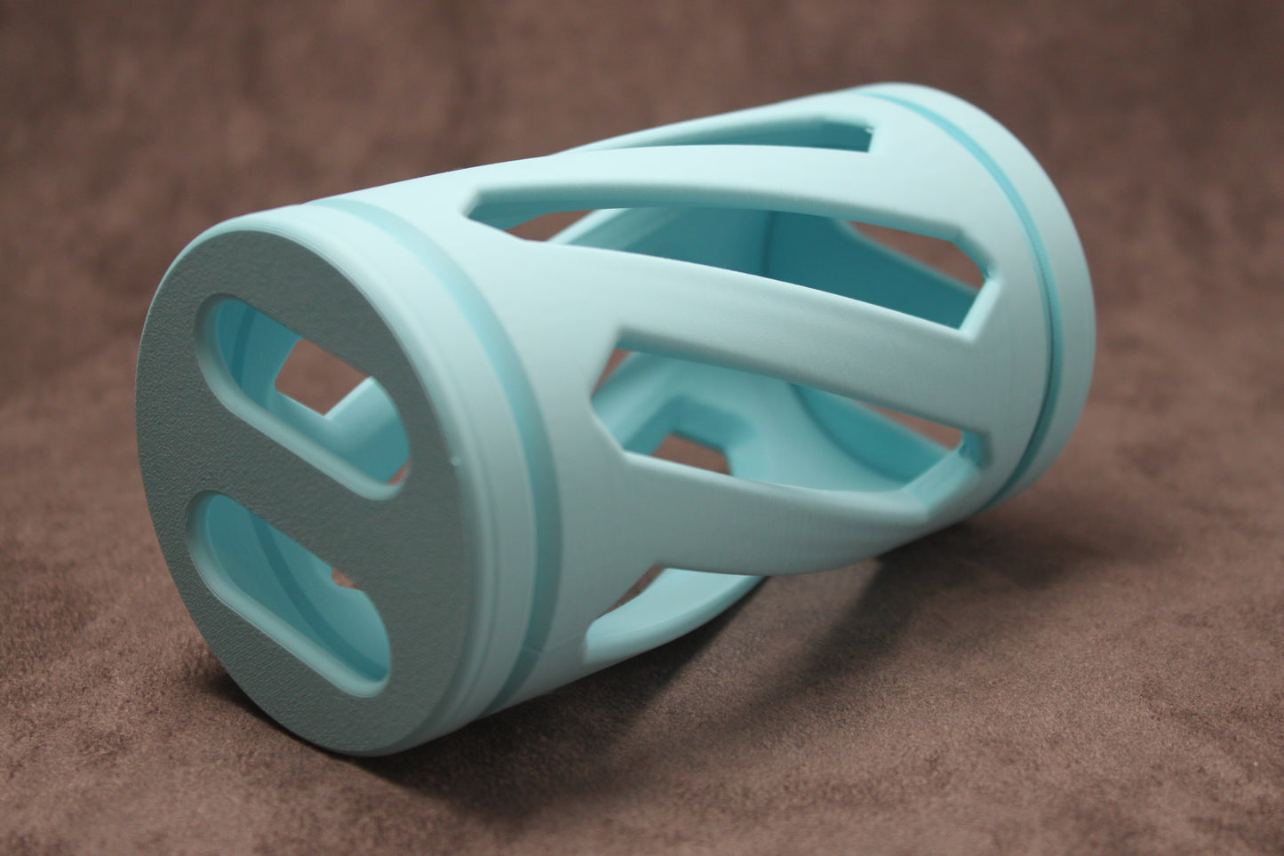 Blue hay roller toy for pet rabbits