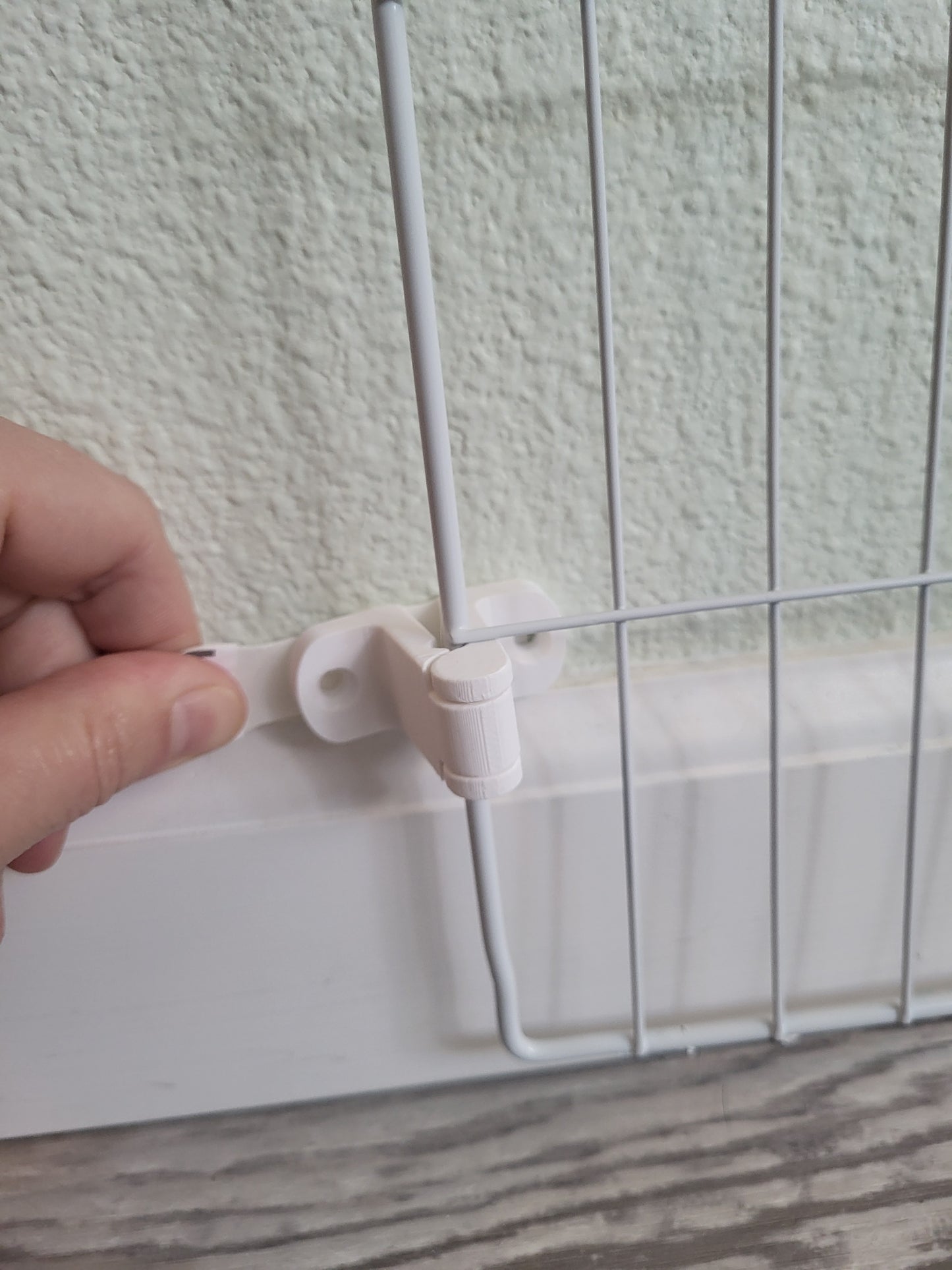 Damage free removal of adhesive strip used to temporarily install pet xpen panels