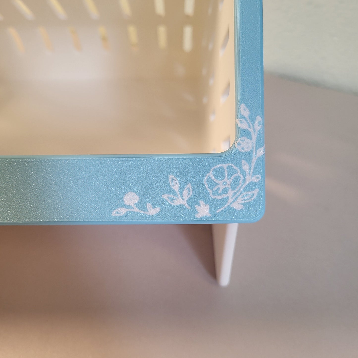 floral design on hay feeder faceplate