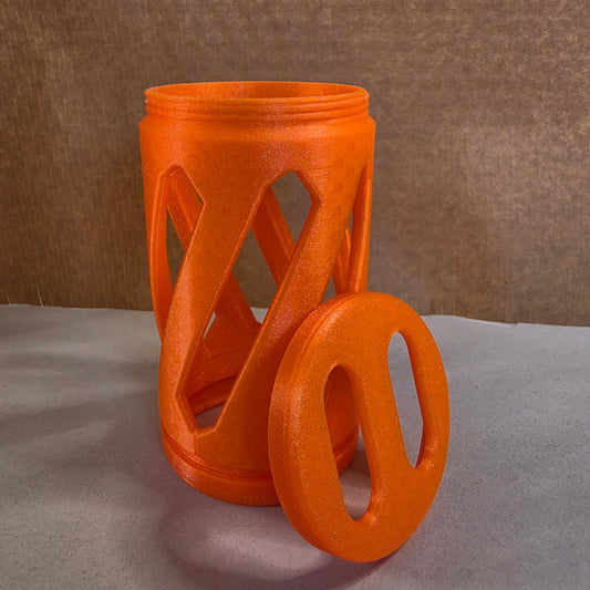 an orange sparkly hay roller toy for rabbits