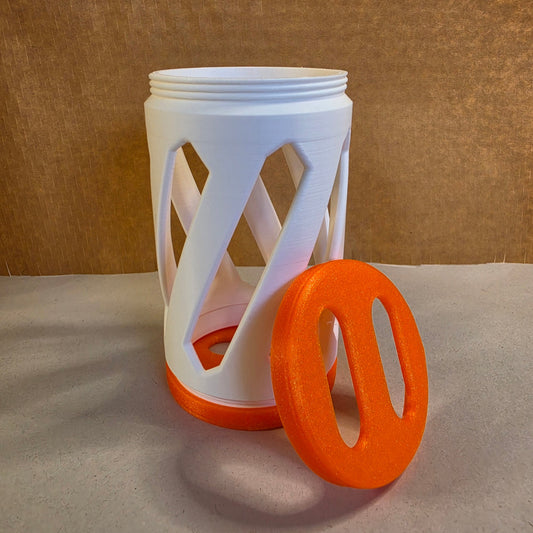 a white and orange hay roller for rabbits