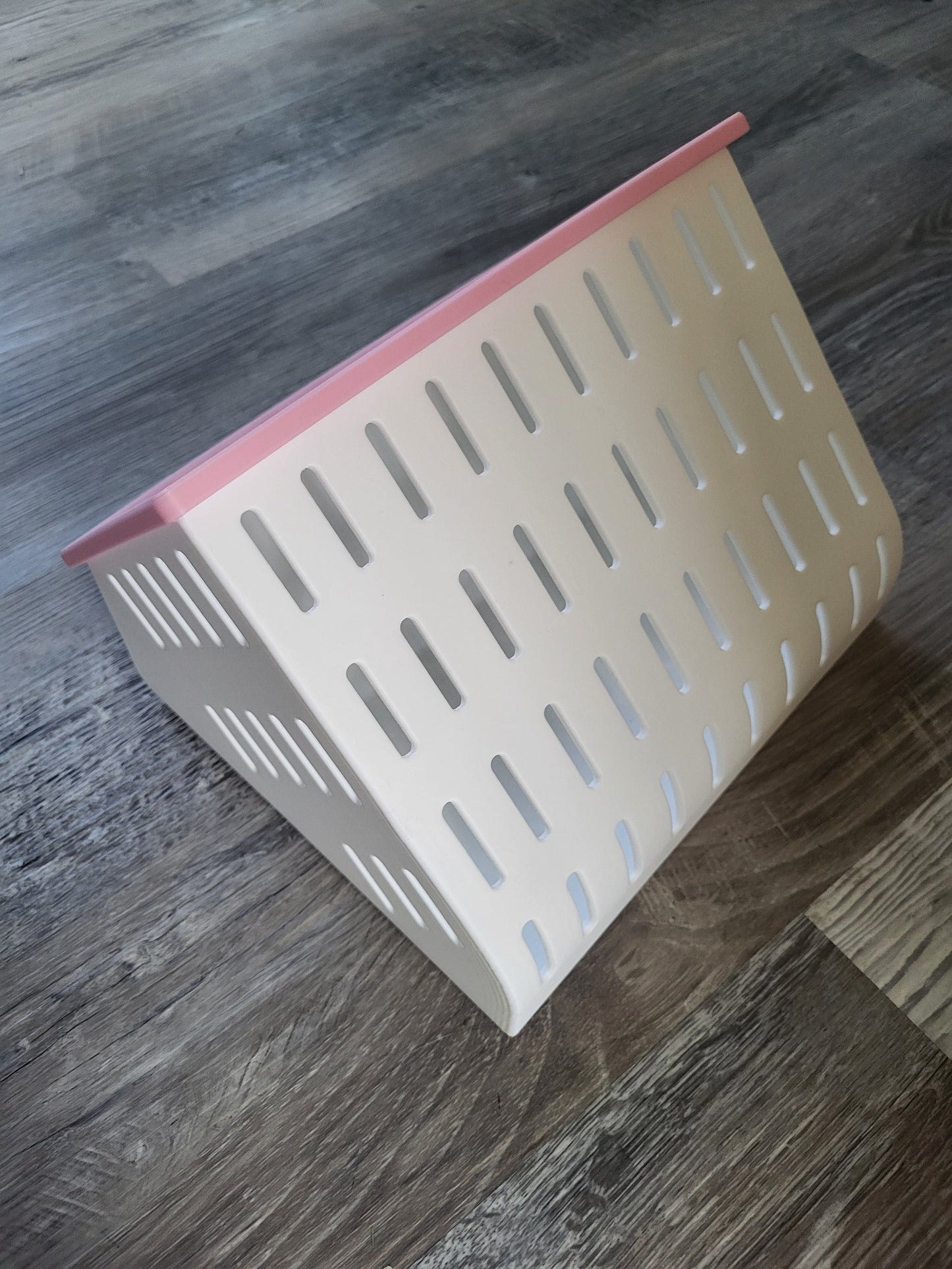 Back view of white 3D printed hay feeder with easy-fill top opening for small pets