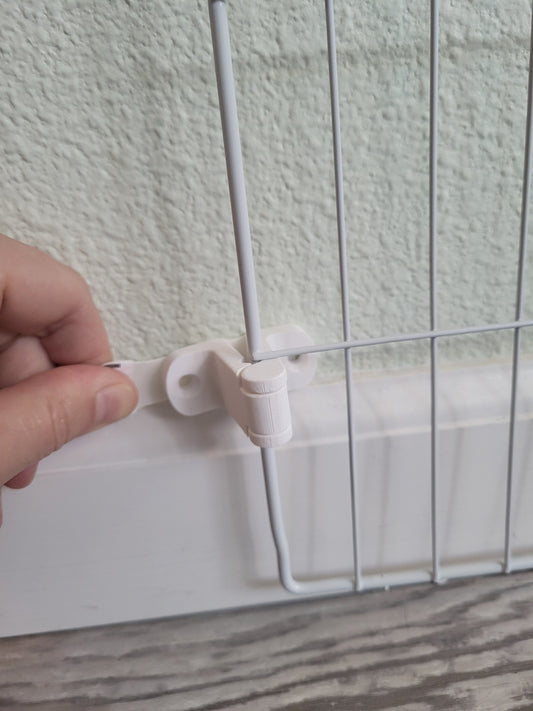 Damage-free removal of XPen adhesive strips for temporary pet pen panel installation