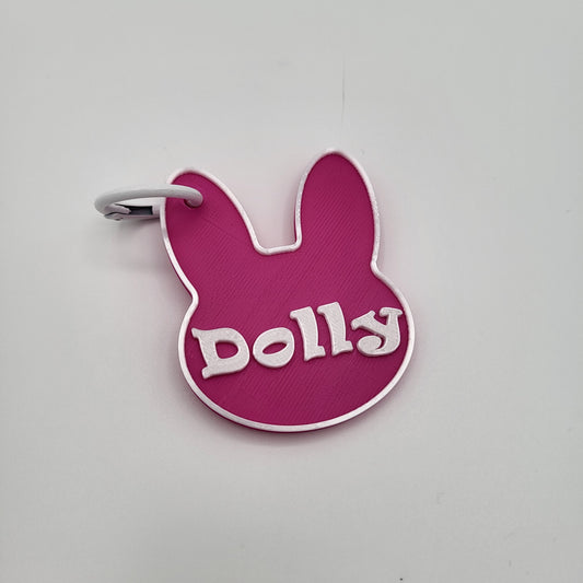 Dolly's Pink Rabbit Carrier Nametag — Fundraiser Edition